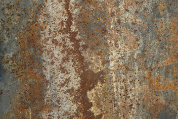 Plate of metal rusty on all background, with old layers of a pai.