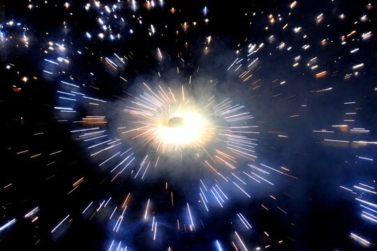 Chakri cracker goes on in Diwali.Chakri went round and round, taking out the spark.