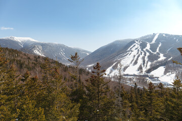 New Hampshire mountains - Cannon and Lafayette, Franconia Notch State Park. Snowy hills and rocks.