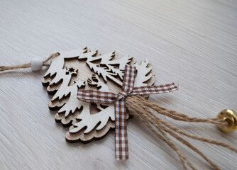 Christmas toy made of wood on a light background