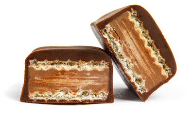 chocolate candy cut in half is isolated on a white background.