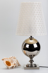 elegant table lamp and beautiful sea shell