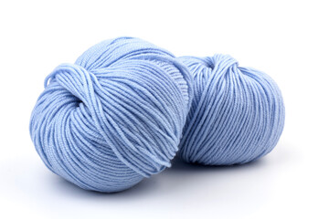 woolen merinos blue threads on white background. natural wool. knitting. background