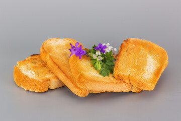 delicious crispy bread toasted toast, fragrant herbs and field flowers
