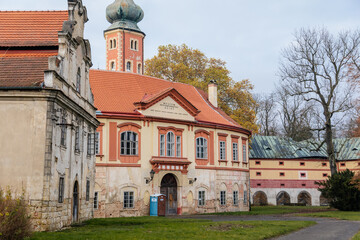 Old abandoned ruined baroque Libechov castle in sunny autumn day, Romantic chateau was heavily damaged after affected by flooding in 2002, Central Bohemia, Czech republic