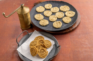 Chakri or Chakli is a spiral shaped savoury snack from India, it is typically made from flours of rice, brown chickpea and black gram.