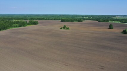 Obraz premium Agricultural fields and reservoirs. Photos taken from a quadrocopter