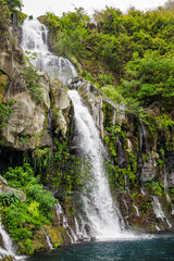 Fototapeta na wymiar Waterfall of Bassin des Aigrettes in Saint-Gilles on Reunion Island