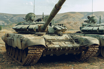 Russian battle tanks at tankodrome in mountains
