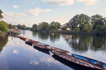 photograph of some boats in the river
