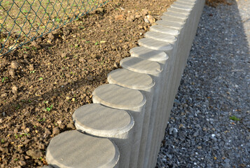 Palisade made of concrete of various shapes and profiles is widely used especially in garden...