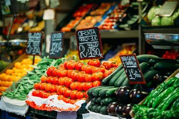 Spain. Tomatoes, courgettes and other agricultural products of local farmers in the grocery market