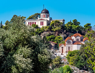 Fototapeta na wymiar the national observatory of Athens and St. Marey orthodox church on top of the nymphs hill, Greece