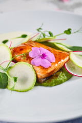 Salmon fillet with zucchini and cream of broccoli