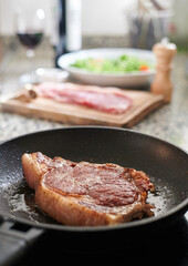 Beef steak to be fried in a hot pan
