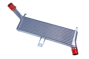 new Car intercooler with metal pipes on a white background. Radiator for cooling a car turbo engine.