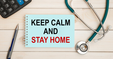 Notepad with text Keep Calm and Stay Home
