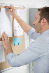 man working in the office board