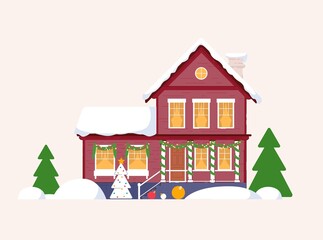 Snow-covered house with christmas fir tree in yard isolated