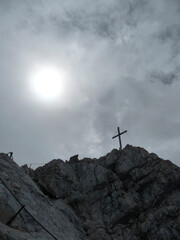Summit cross at Alpspitze via ferrata in Garmisch-Partenkirchen, Bavaria, Germany