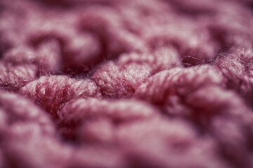 Obraz premium Texture of hand-knitted wool close-up