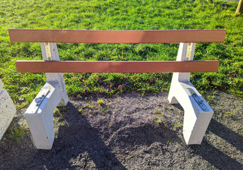 broken park bench at daytime closeup photo