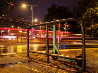 Fototapeta na wymiar electric scooter on a rainy night city street