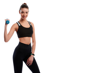 Smiling attractive caucasian slim woman doing physical exercise using dumbbell isolated on white...