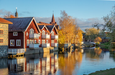 Old tow of Falun with traditional, picturesque, red wooden houses in the city of Falun in Dalarna,...