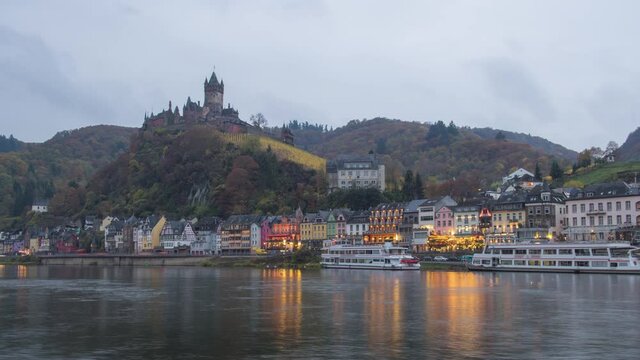 Day to night Time-lapse of Cochem in autumn with Moselle river, Cochem, Germany