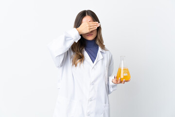 Young Romanian scientific woman isolated on white background covering eyes by hands. Do not want to see something