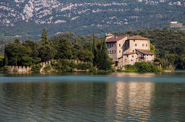 Fototapeta na wymiar Toblino Castle on the Toblino lake, in the municipality of Madruzzo, Trento Province, Italy.