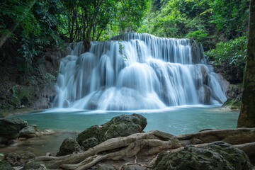 Obraz premium Huay Mae Khamin waterfalls in deep forest at Srinakarin National Park ,Kanchanaburi ,A beautiful stream water famous rainforest waterfall in Thailand