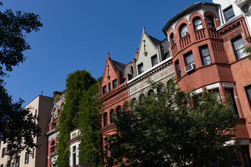 Obraz premium Row of Colorful Old Brick Residential Buildings on the Upper West Side of New York City
