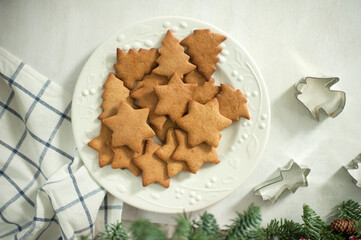Ginger cookies on white plate. Top view.