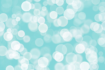 Beautiful blue background with many blurry white lights similar to bokeh..