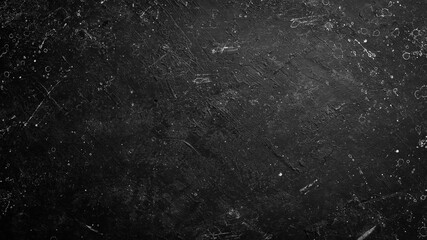 Black textured stone background. Top view. Rustic style.