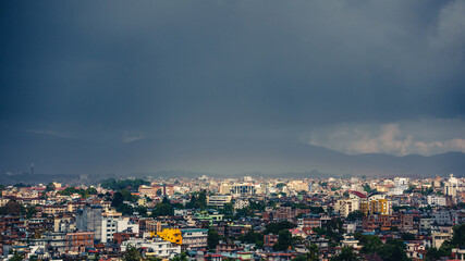 Naklejka premium Dark stormy clouds over Patan and Kathmandu in Nepal
