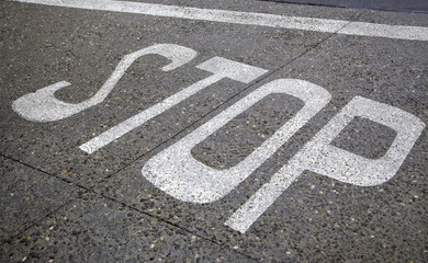 Stop sign on the asphalt