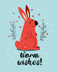 Cute cartoon bunny with lettering on snow background. The Warm wishes phrase. Greeting card with funny character. Vector flat illustration.