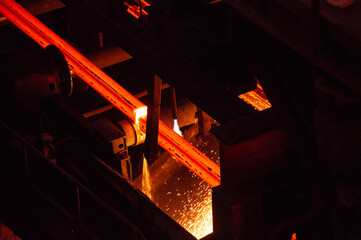 production of hot rolled products in a metallurgical shop. finished products go along the conveyor