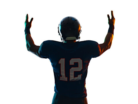 one afro american football player man in studio silhouette shadow isolated on white background