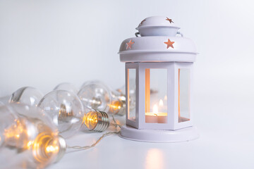 Lantern with candle and lamps on white background. Christmas lantern. Christmas composition and...