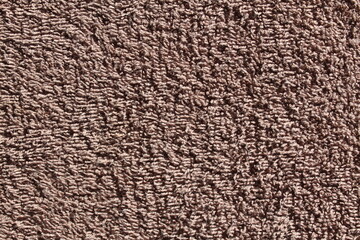 Texture of brown fabric in the form of a towel