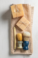 Fototapeta na wymiar Vintage shaving set with razor, brush and soap