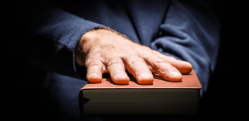 Taking an oath in court.