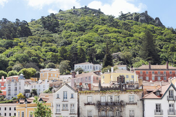 Fototapeta na wymiar Old buildings, a park and the view over the Moorish Castle in Sintra, Portugal