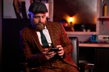 serious business man in suit using smartphone,he makes business phone call, communication, phone message, use phone communication technology.