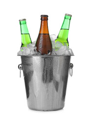 Metal bucket with bottles of beer and ice cubes isolated on white
