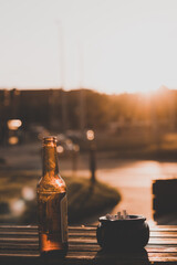 Beer and Cigarettes in the sunset